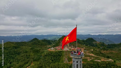 Vietnamese flag waving from the Lung Cu flag tower in Ha Giang
