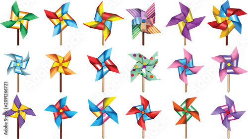 Foto Colorful paper pinwheel wind turbines set with bright plastic vanes on wooden st