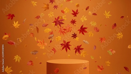 Colorful Leaves Float in the Air With a Bright Orange Background During Autum...