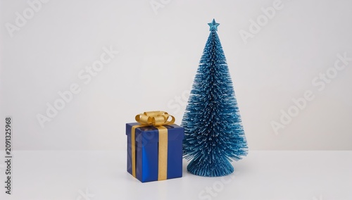 Blue Christmas Tree and Blue Gift Box on White Background