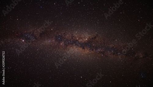 Stars Fill the Night Sky With a View of a Galaxy in a Dark Location During a ...