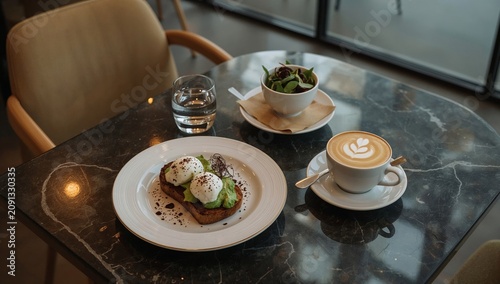 Breakfast Served at a Cafe With Eggs, Toast, Coffee and Juice on a Table