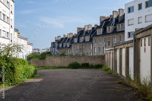 Bilde på lerret Brest, France - June 20, 2026 A row of residential garages behind a housing neighborhood in Brest, Brittany, showing everyday urban architecture and city planning