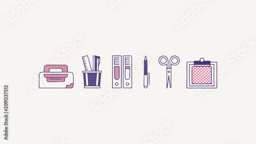 Office supplies and stationery are neatly arranged on a table indoors.