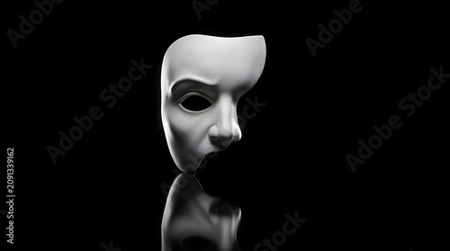 A stark white theatrical mask representing the Phantom of the Opera resting upon a polished black reflective surface in a dark empty room
