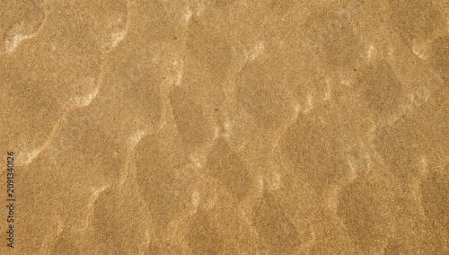 Sand Patterns on a Beach Surface With Soft Waves Captured in Bright Sunlight ...