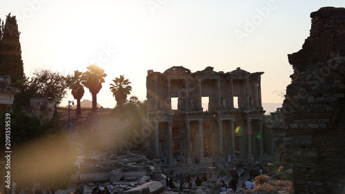 Night view of the historic Ephesus Ancient City in Turkey, showcasing illuminated Roman ruins and timeless classical architecture after sunset.