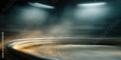 The abstract motion blur of a racing track at night with dramatic lighting, conveying speed and excitement