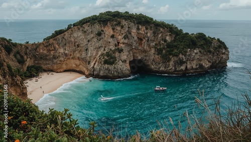 Scenic Coastline With a Boat and People at the Beach Near a Large Rock Format...
