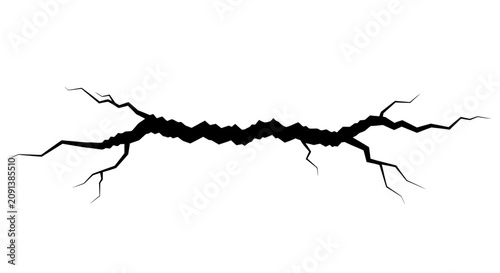 Foto Cracked surface with jagged fissures a black silhouette against a white backgrou