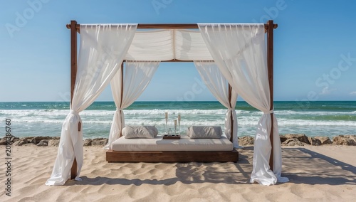 Cozy Seating Area on a Beach With White Curtains and Soft Cushions Facing the...