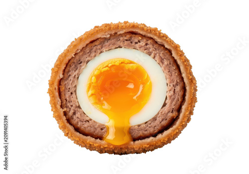 Scotch egg cut in half isolated on transparent background, yolk dripping down