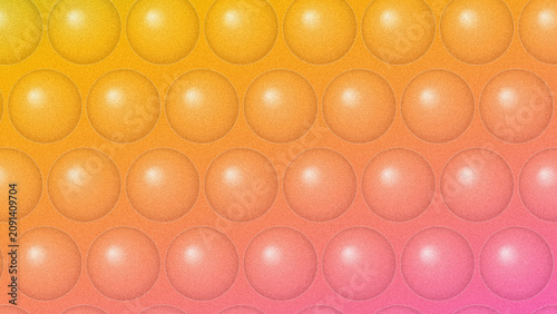 Abstract bubble wrap texture with a colorful yellow to pink gradient background