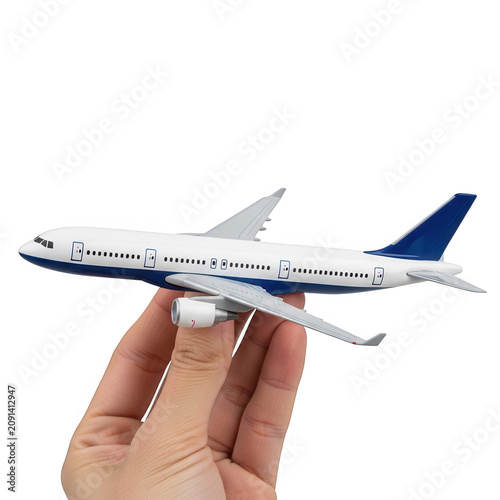 Hand holding a miniature model airplane isolated on transparent background