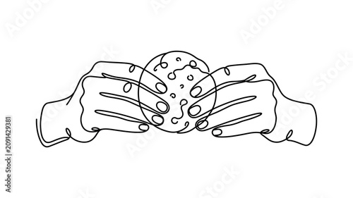 Fotografija Hands holding a chocolate chip cookie.
