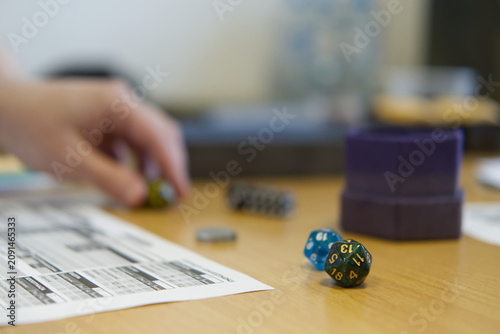 фотографія Stock photo showing two role-playing polyhedral dice on the table