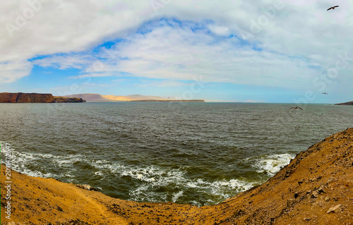 Peru, South America: breathtaking aerial and panoramic view of the landscape hiking on the cliffs of the Paracas National Reserve, a protected natural area on the southern coast