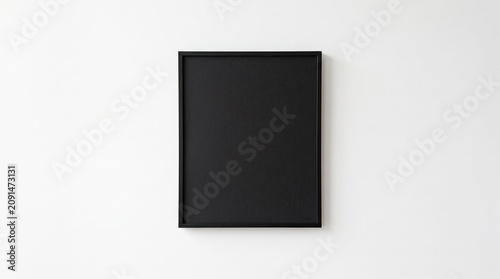 A black square on a white background with subtle shadow effects
