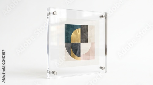 A geometric art piece in a glass frame on a white background