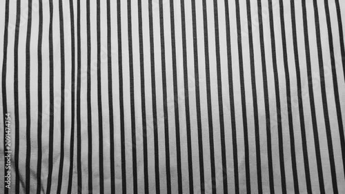 monochrome pinstripe fabric texture showcases clean minimalist aesthetic for sustainable fashion design background