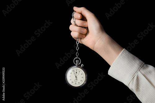 Hand holding a classic anal...