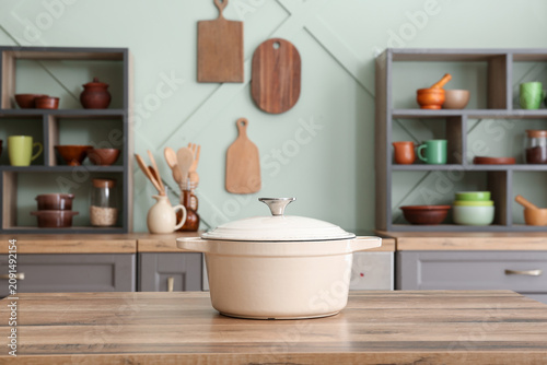 Cream colored dutch oven on...