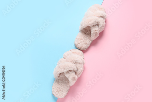 Soft pink slippers on color...