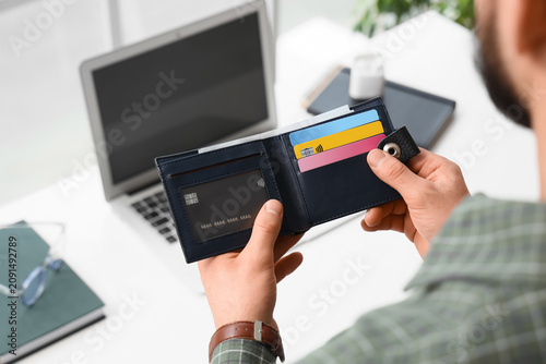 Man with wallet and credit ...