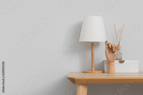 Lamp, box and wooden hand o...