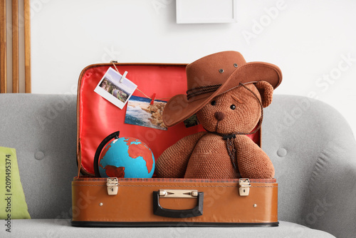 Open vintage suitcase with ...