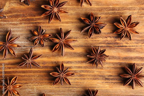 Many anise stars on wooden ...