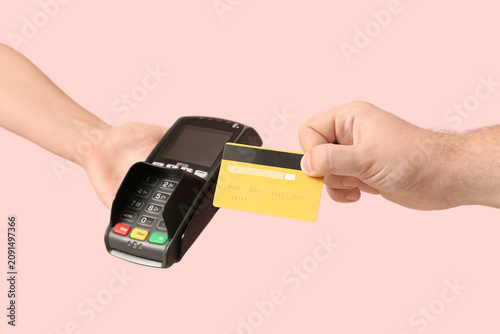 Male hand with credit card ...