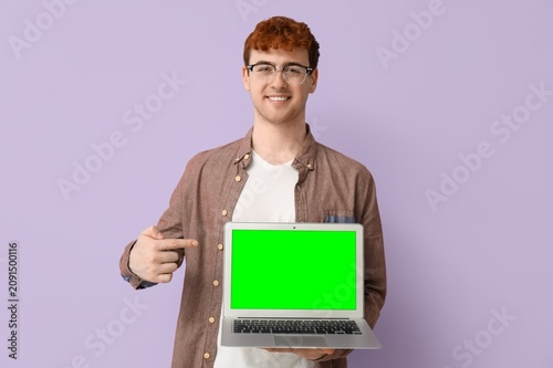 Smiling young man with red ...