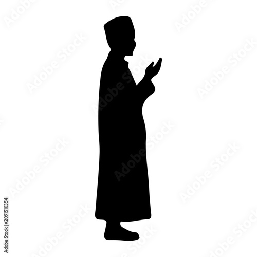 Slika na platnu Silhouette of Person in Prayer or Meditation Pose.