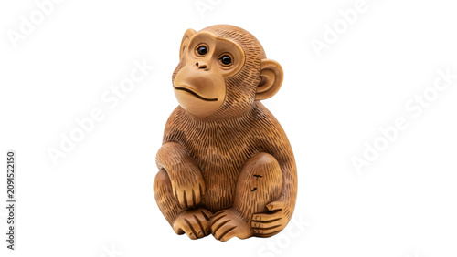 Wooden monkey sitting on its hinds on black background with black back.