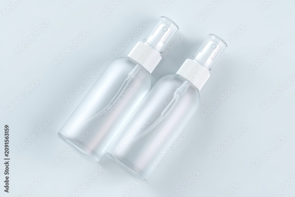 Fototapeta premium Pair of empty clear spray bottles for cosmetic products with cosmetic packaging skincare container transparent wellness template minimalist background commercial branding marketing