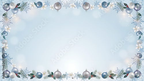 Winter holiday frame with blue ornaments, snowflakes, and pine branches