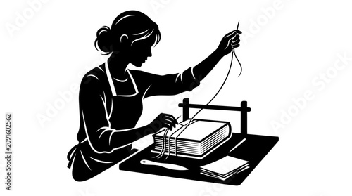 Fotografie Bookbinder stitching pages of an old book with needle and thread, silhouette ill