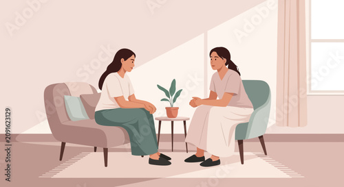 Two women talking on comfortable chairs in a light, modern living room with houseplants