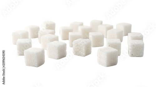 Schilderij op canvas White sugar cubes scattered randomly with sparkling granulated texture in shallo