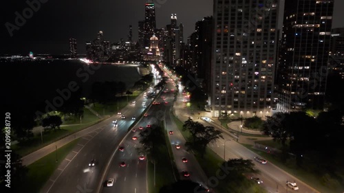 Aerial Reveal Of Downtown Chicago & Lakeshore Drive At Night