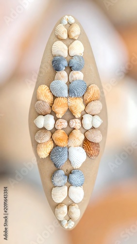 Surfboard Decorated with Seashells in a Coastal Setting
