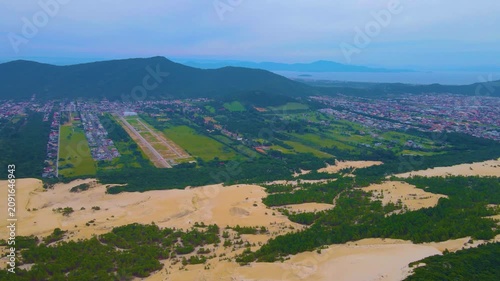 Panoramic Morning View of Autumn Mountains and Green Countryside Under a Cloudy Sky