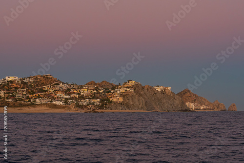 cabo san lucas beaches and resorts at southernmost point of baja california peninsula during twilight