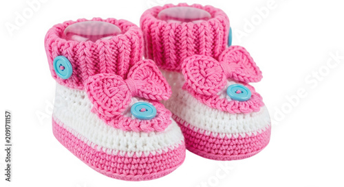 Pink and blue knitted baby booties isolated on transparent background