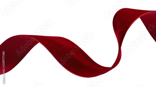 Fotografie Luxurious deep red velvet ribbon flowing in a gentle curve, isolated on transpar