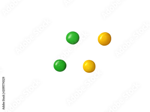 Cuadro en lienzo Green and yellow round candy buttons isolated on white background