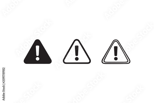 Warning sign icons with exclamation point black and white silhouette