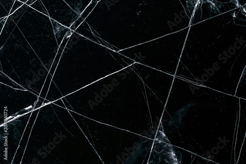 Cracker dark ice texture or black glass fracture abstract background