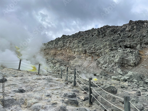 Konstfotografi Steam Rising Across a Rugged Geothermal Volcanic Terrain